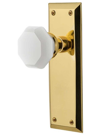 New York Door Set with Milk White Waldorf Crystal Glass Knobs in Un-Lacquered Brass.